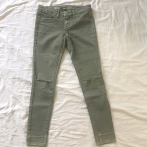 green ripped mid rise jegging